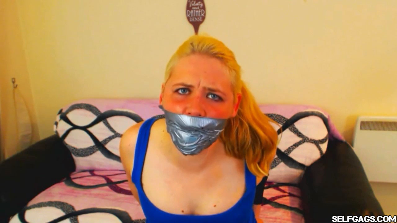 tightly tape gagged mouth