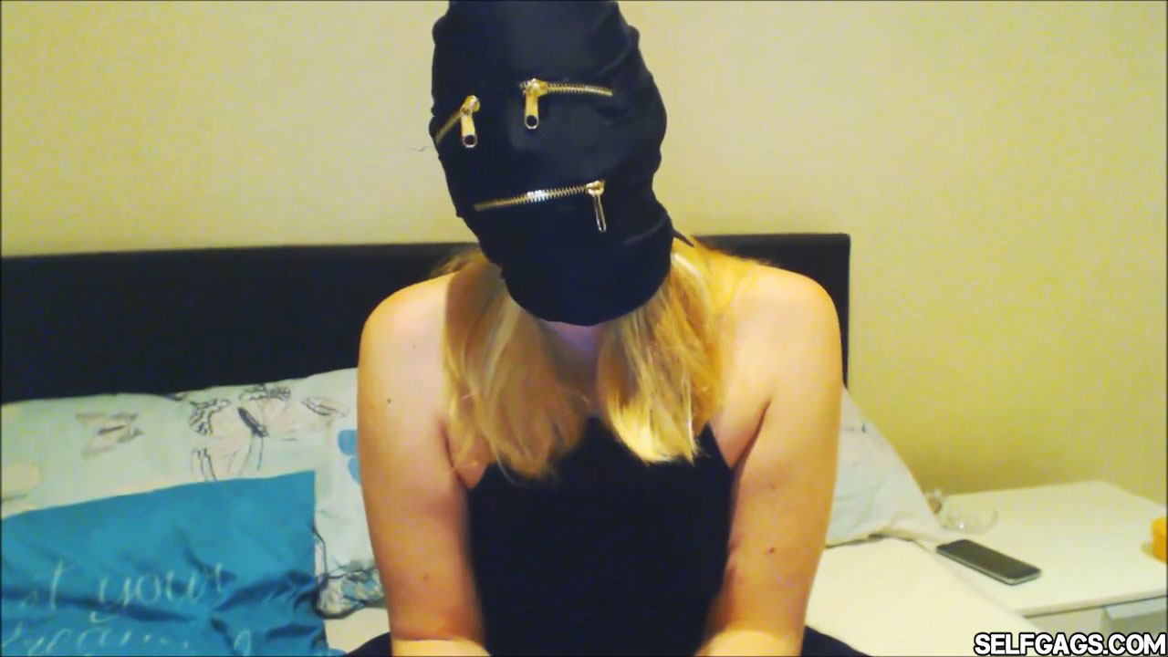 bdsm hood with zippers on tightly gagged girl selfgags