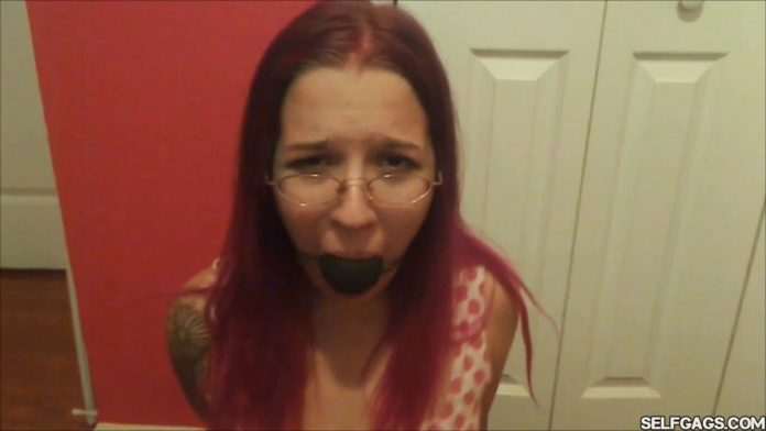 Captured ball gagged college girl