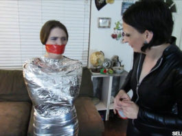 Young girl wraparound tapegagged in tight mummification bondage selfgags