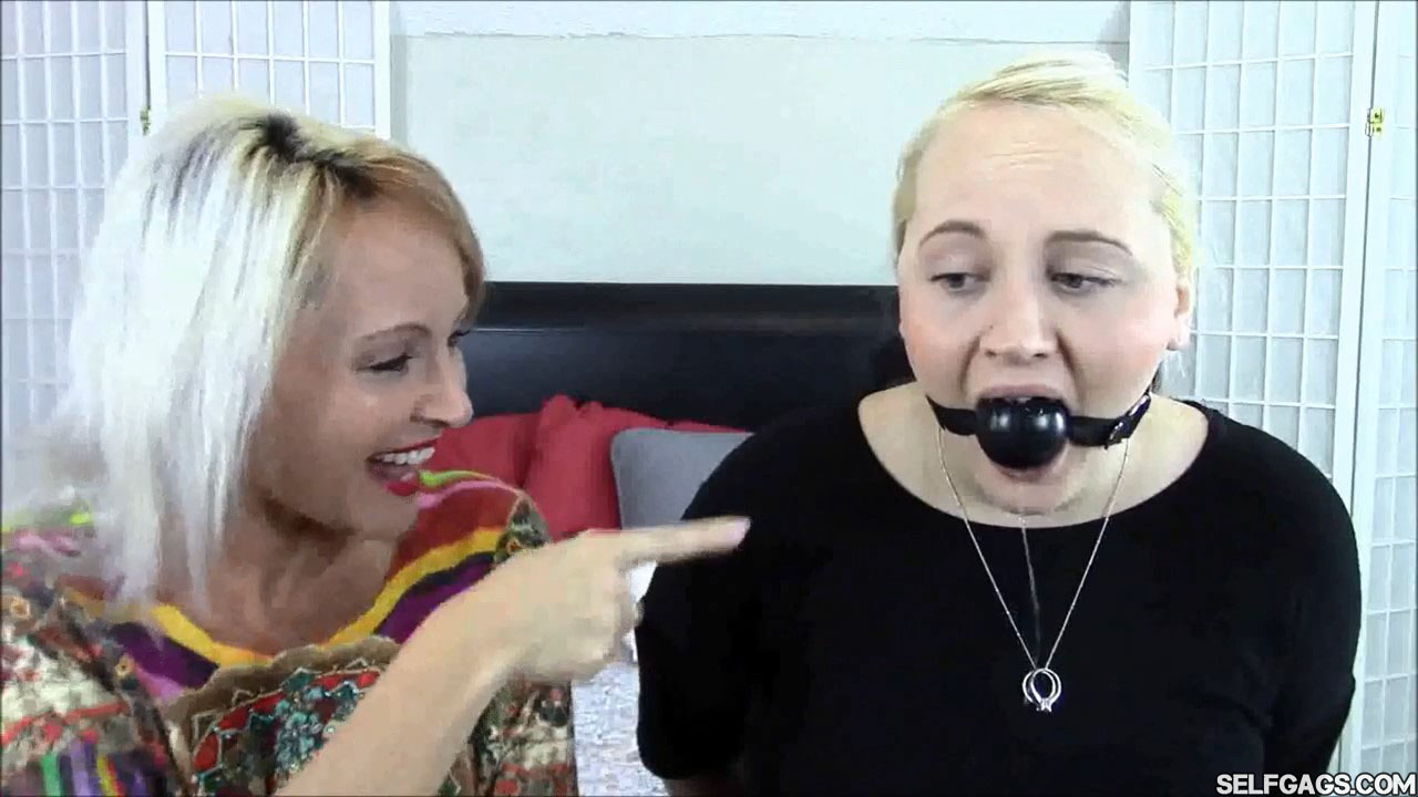 mother laughs at ball gagged drooling daughter selfgags