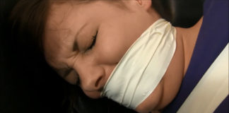 Tightly Gagged And Completely Immobilized By The Catsuit Burglars! Tightly tape gagged girl crying