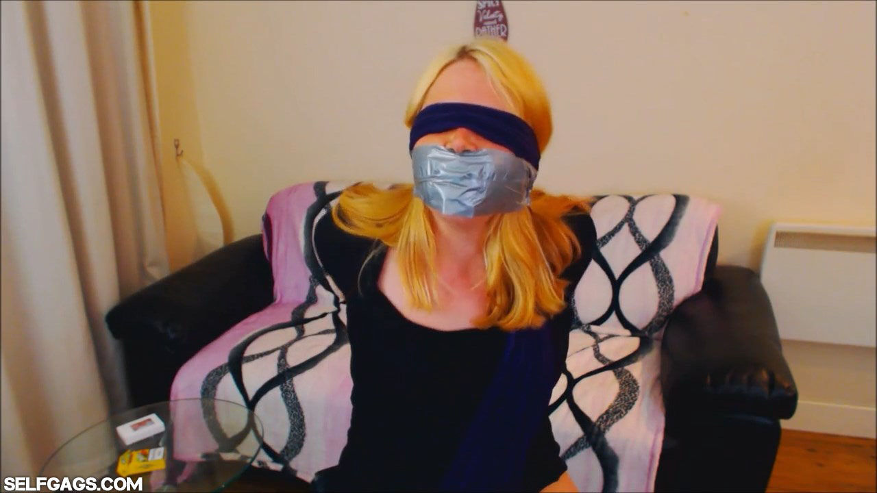 Blindfolded and tape gagged girl Anne Dville