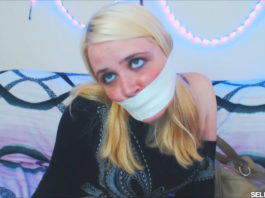 Microfoam Tape Gag Talk With Anne Dville Blonde girl tape gagged tight with microfoam tape at selfgags.com