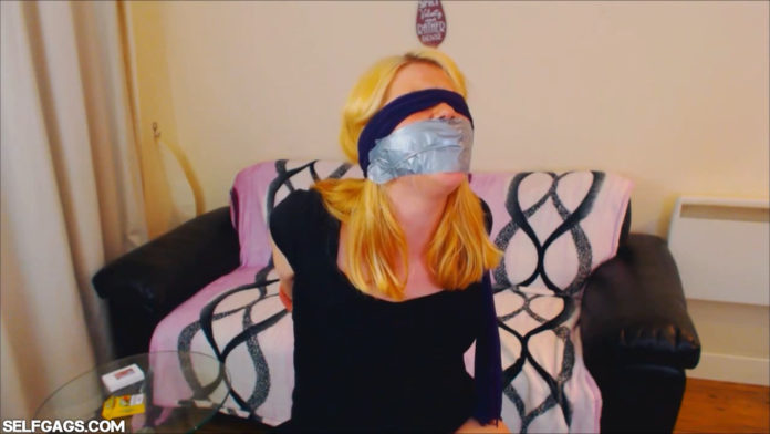 Drunk girl Anne Dville blindfolded and tape gagged