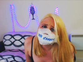A Panty Stuffed Mouth And A Heavy OTN Tape Gag Makes It So Hard To Talk! Anne Dville tape gagged with an otn gag