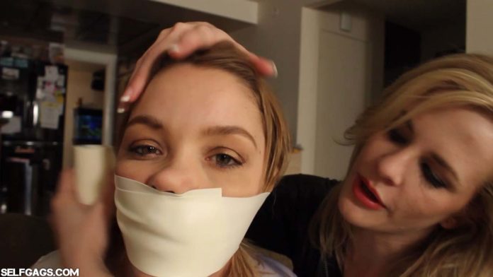 Girl gagged with microfoam tape