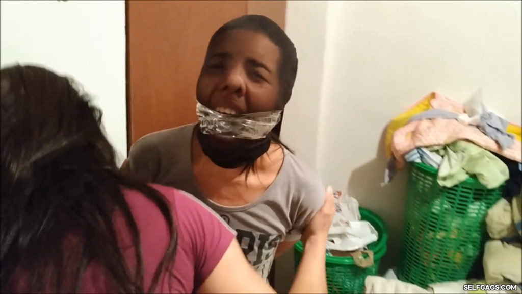 latina girl pantyhose head encased and cleave gagged with tape
