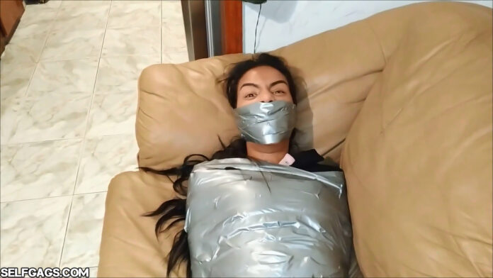 gagged girl in tight tape mummified bondage