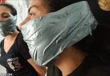 Pretty latina girls bound and gagged tight with duct tape around the head as big wraparound gags in the style of borderland bound