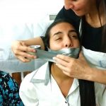 Sexy-Bondage-Girl-In-White-Shirt-Duct-Tape-Wrap-Gagged-Tight-By-Strong-Femdom-Milf-1