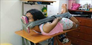 Latina Teen Babysitter Hogtaped On Table With A Super Stinky Running Shoe Tied To Her Face! Sexy latina babysitter in duct tape hogtie bondage with smelly shoe tied to face