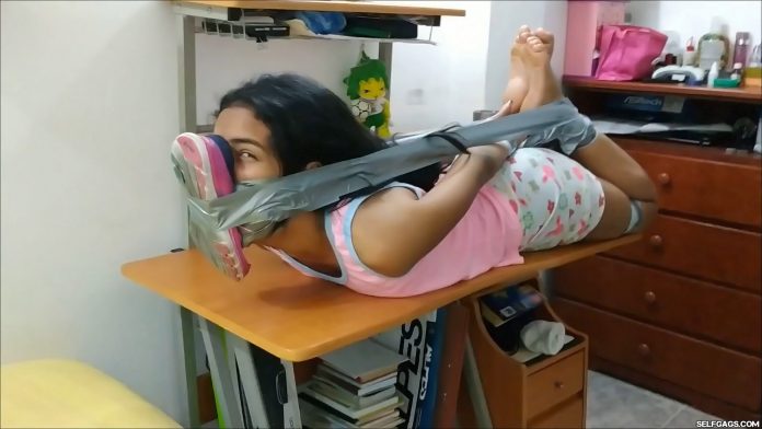 Sexy latina babysitter in duct tape hogtie bondage with smelly shoe tied to face