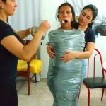 Gagged Latina Girl Wrapped In Sheets And Mummified With Duct Tape Bondage