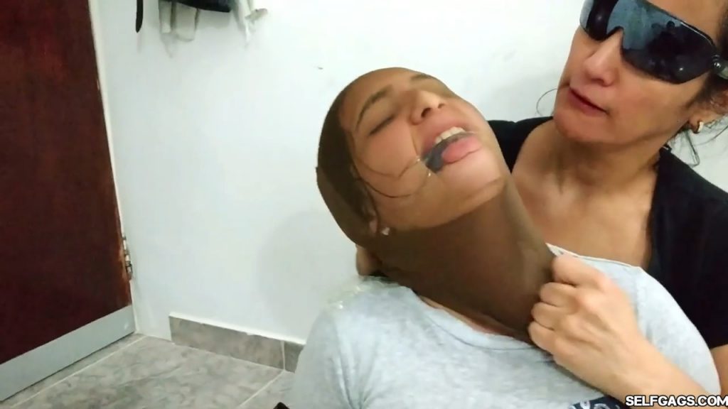 Bound and gagged girls hooded with pantyhose and hogtied for tight bdsm