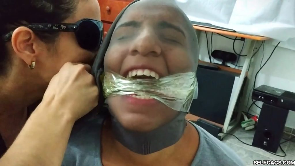 Bound and gagged girls hooded with pantyhose and hogtied for tight bdsm