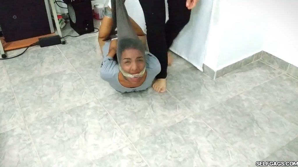 Bound and gagged girls hooded with pantyhose and hogtied for tight bdsm