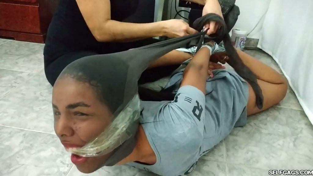 Bound and gagged girls hooded with pantyhose and hogtied for tight bdsm