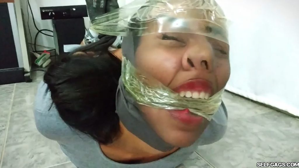 Bound and gagged girls hooded with pantyhose and hogtied for tight bdsm