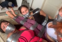 Three gagged girls in tape bondage