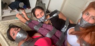 Three gagged girls in tape bondage
