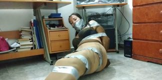Pantyhose Encased Babysitter Tied Up And Gagged Pantyhose encased babysitter tied up and gagged with duct tape