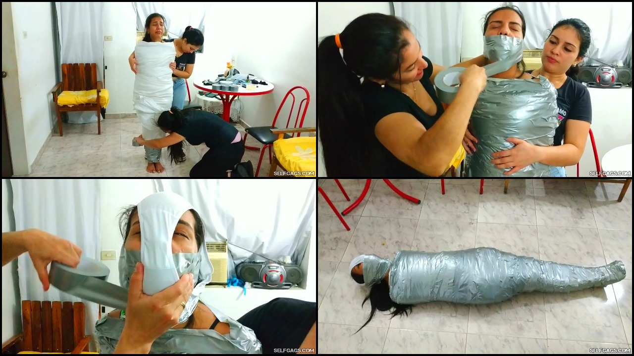 Pantyhooded girl stuck in tight tape mummification bondage | GagTheGirl