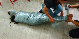 Tape Gagged Girl Pantyhooded And Mummified Tape Gagged Girl Mummified And Pantyhooded