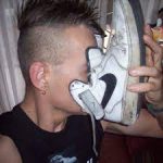 Guy Smelling Dirty Sneakers