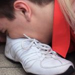Guy Smelling Female Sneakers