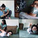 Girl with glasses tied up and gagged by sexy latina