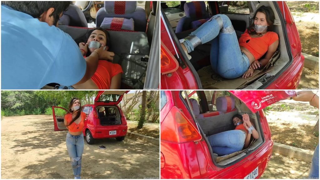 Sexy bondage girl gagged in car trunk