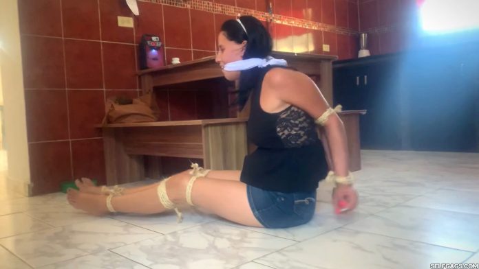 Elbow tied girl cleave gagged in kitchen bondage
