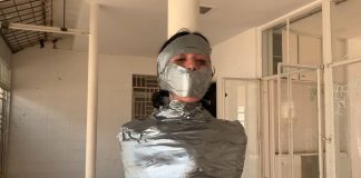 Stranded Girl Pole Mummified In Abandoned House Stranded girl duct taped to pole and gagged tight