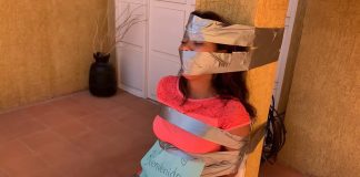 Gagged Party Girl Duct Taped To Pillar Duct tape gagged girl in outdoor tape bondage