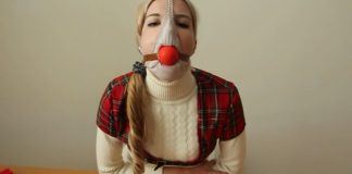 Self Gagged Blonde Scandinavian Schoolgirl Panty hooded blonde schoolgirl ball gagged