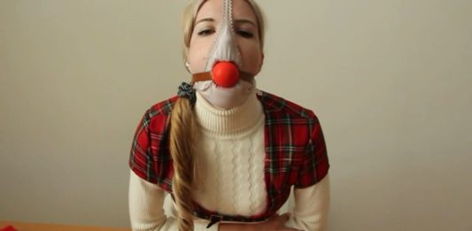 Self Gagged Blonde Scandinavian Schoolgirl Panty hooded blonde schoolgirl ball gagged