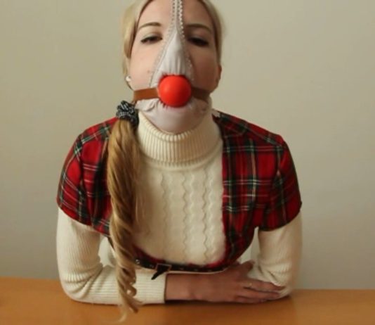 Self Gagged Blonde Scandinavian Schoolgirl Panty hooded blonde schoolgirl ball gagged