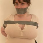 Busty girl annoyed to be bound