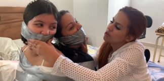 Sister And Nanny Stuck In Tight Tape Bondage Sister and nanny gagged in tight duct tape bondage