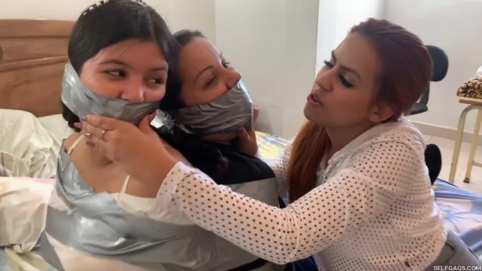 Sister and nanny gagged in tight duct tape bondage