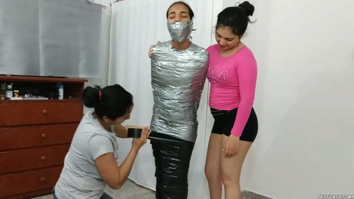 Extreme BDSM duct tape mummification bondage
