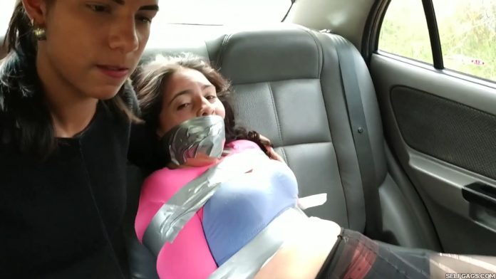 Gagged woman bound in car