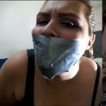 Amateur cam girl gagged with duct tape