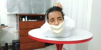 Tightly Hogtied With Extreme Microfoam Tapegag! Hogtied tight with microfoam tape gag