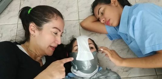 Schoolgirl Mummified And Panty Hooded Panty hooded girl tape gagged in mummification bondage