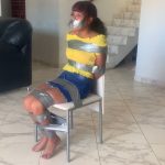 Cute girl duct taped to chair and tape gagged