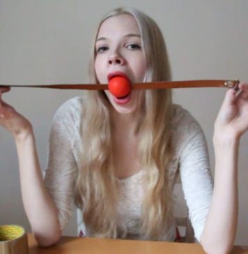 Young Scandinavian Babe Self Gagged Blonde girl ball gagging herself