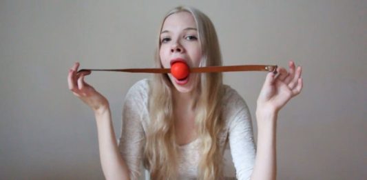 Young Scandinavian Babe Self Gagged Blonde girl ball gagging herself