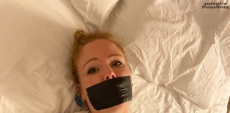 Bound Redheaded Hotel Hostage Tape gagged redhead in tape bondage